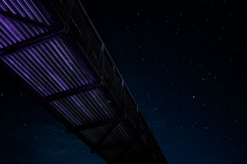 Stars Shining Above Walkway Bridge (Blue Tint Photo)