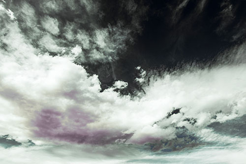 Sunset Illuminating Large Cloud Mass (Blue Tint)