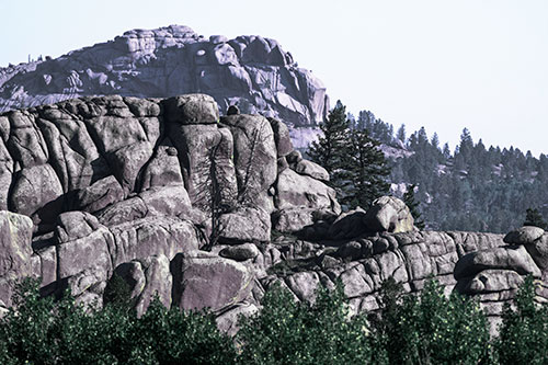 Two Towering Rock Formation Mountains (Blue Tint Photo)