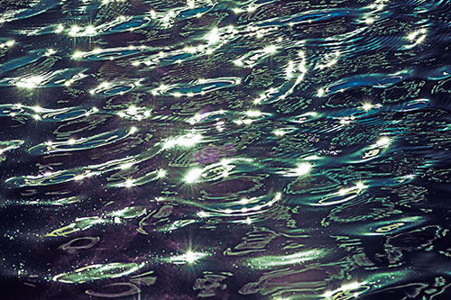Water Ripples Sparkling Among Sunlight (Blue Tint Photo)