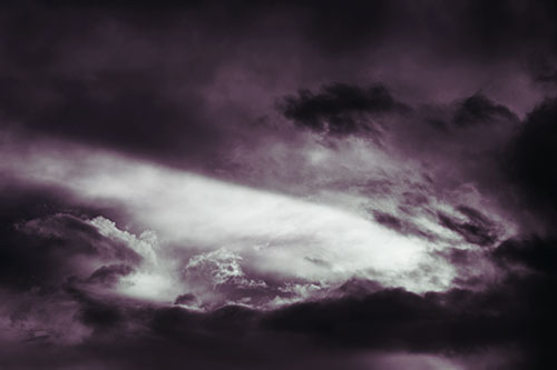 White Light Tearing Through Clouds (Blue Tint)