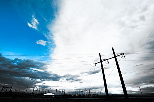Cloud Clash Sunset Beyond Electrical Substation (Blue Tone Photo)