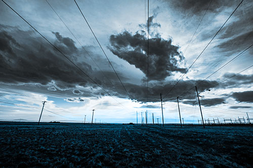 Creature Cloud Formation Above Powerlines (Blue Tone)