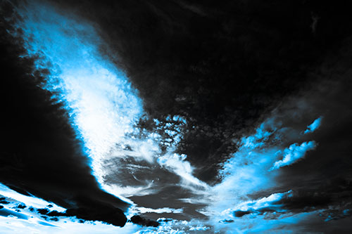Curving Black Charred Sunset Clouds (Blue Tone Photo)