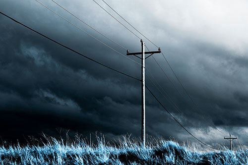Dark Thunderstorm Clouds Over Powerline (Blue Tone Photo)