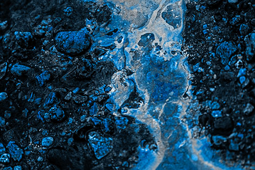 Distorted Oil Face Smearing Among Rocky Shore (Blue Tone)