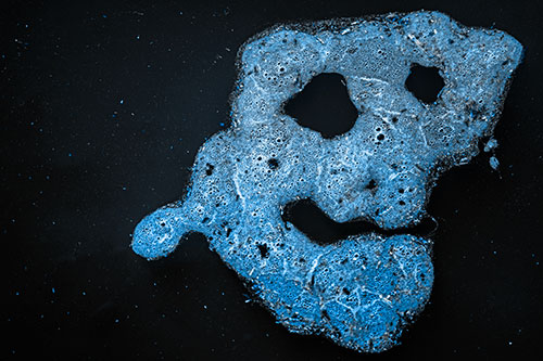 Droopy Smiling Bubble Face Floating Above Soil (Blue Tone)