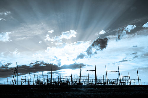 Electrical Substation Sunset Bursting Through Clouds (Blue Tone Photo)