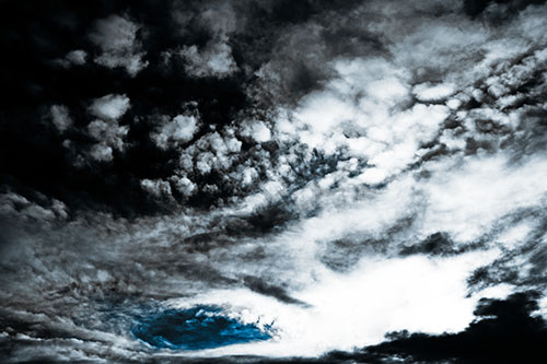 Evil Eyed Cloud Invades Bright White Light (Blue Tone Photo)