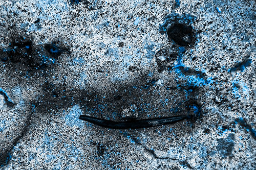 Evil Eyed Concrete Face Evaporating (Blue Tone Photo)