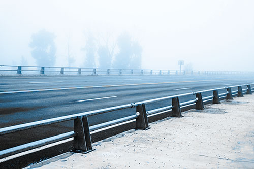 Fog Surrounds Deserted Sidewalk Roadway (Blue Tone Photo)