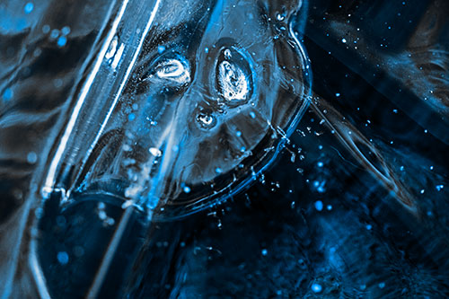 Frozen Unhappy Frowning Distorted River Ice Face (Blue Tone Photo)