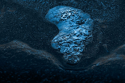 Frozen Water Bubble Mass Formation Along River (Blue Tone Photo)