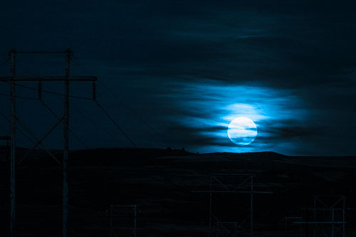 Full Moonrise Behind Mountain (Blue Tone Photo)