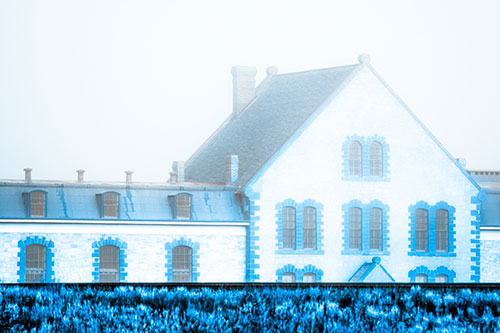 Historic State Penitentiary Oozes Among Fog (Blue Tone Photo)