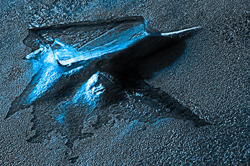 Jagged Melting River Ice Submerging (Blue Tone Photo)