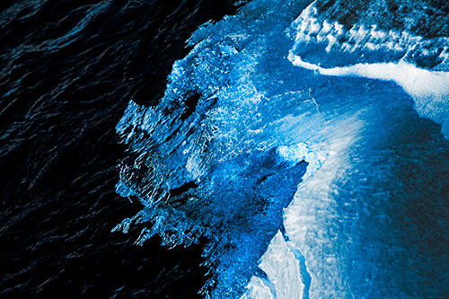 Melting Ice Face Creature Atop River Water (Blue Tone)