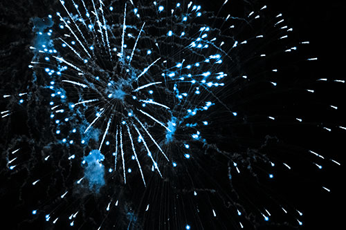 Multiple Firework Explosions Send Light Orbs Flying (Blue Tone Photo)