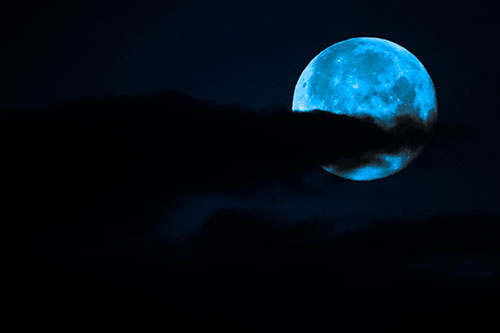 Pac Man Moon Swallows Clouds (Blue Tone Photo)