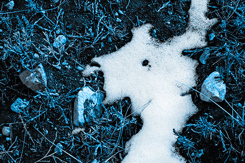 Peering Humanoid Snow Face Creature Among Rocks (Blue Tone Photo)
