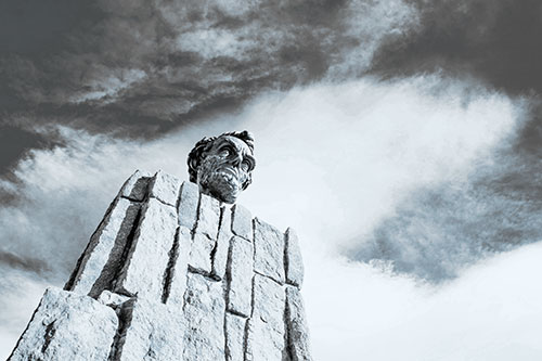 Presidents Statue Standing Tall Among Clouds (Blue Tone Photo)