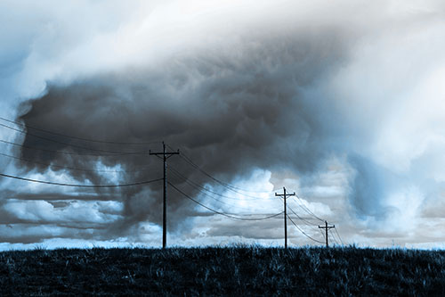 Rainstorm Clouds Twirl Beyond Powerlines (Blue Tone)