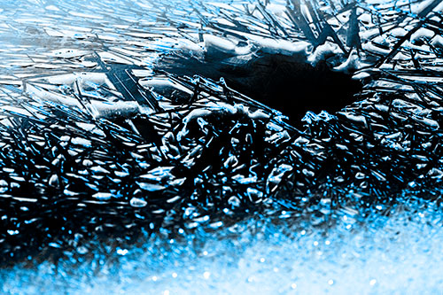 Shattered Ice Crystals Surround Water Hole (Blue Tone Photo)