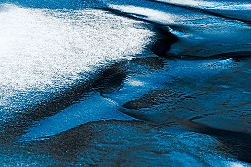 Sloping Ice Melting Atop River Water (Blue Tone)