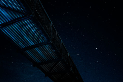 Stars Shining Above Walkway Bridge (Blue Tone Photo)