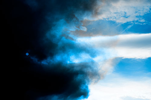 Sun Spiraling Out Of Mullen Fire Clouds (Blue Tone Photo)