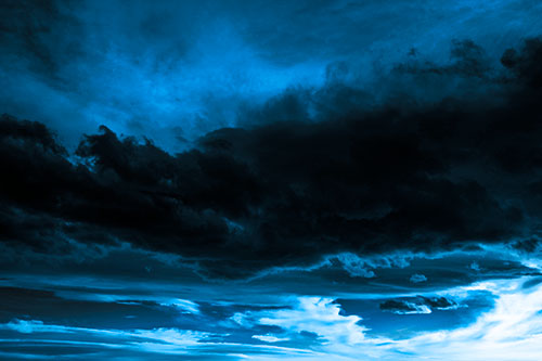 Sunset Producing Fire Orange Clouds (Blue Tone Photo)