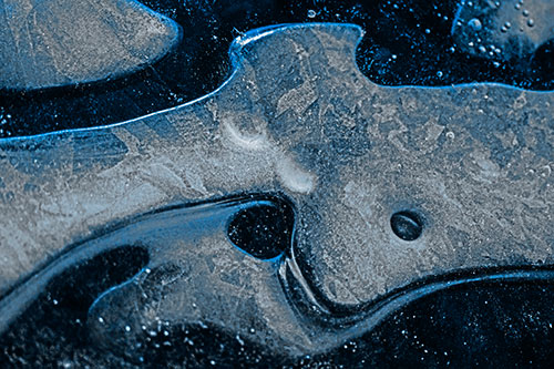 Swirling Frozen Smiling Bubble Eyed River Ice Face (Blue Tone)