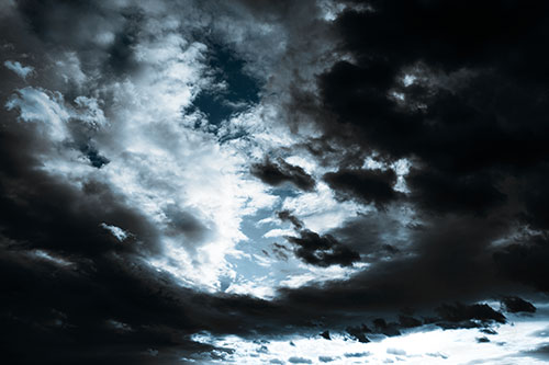 Thick Dark Cloud Refuses To Split In Half (Blue Tone Photo)