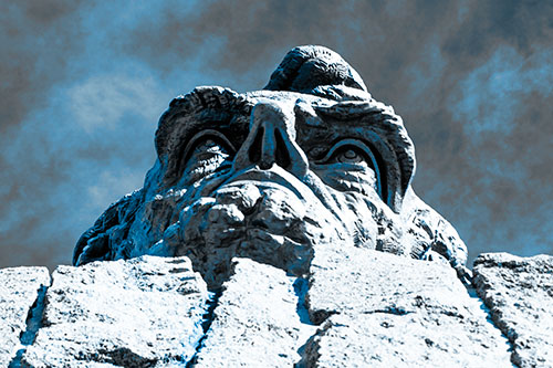 Vertical Upwards View Of Presidents Statue Head (Blue Tone Photo)