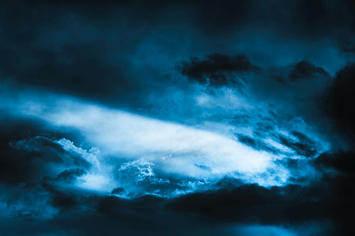White Light Tearing Through Clouds (Blue Tone)