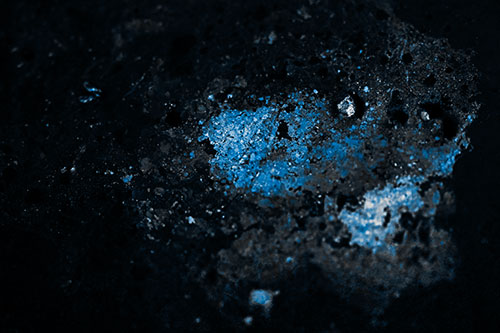 Wide Eyed Oil Demon Face Floating Atop Water (Blue Tone)