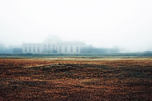 Dense Fog Consumes Distant Historic State Penitentiary