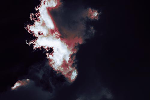 Evil Cloud Face Snarls Among Sky