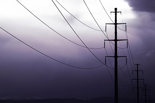 Powerlines Receding Into Thunderstorm