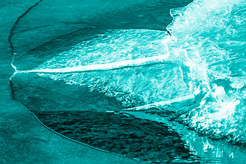 Abstract Ice Sculpture Forms Atop Frozen River (Cyan Shade Photo)