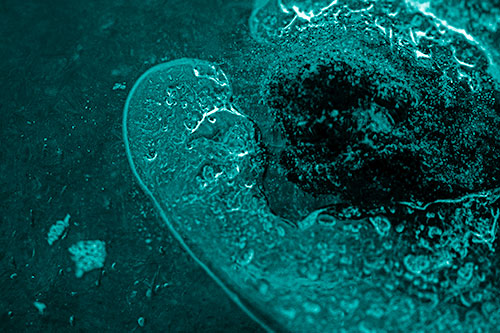 Angry Eyebrow Raised Ice Bubble Creature Bending Beside Mossy Rock (Cyan Shade)