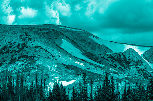 Clouds Cover Melted Snowy Mountain Range (Cyan Shade Photo)