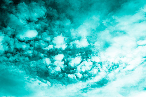 Cluster Clouds Forming Off White Mass (Cyan Shade Photo)