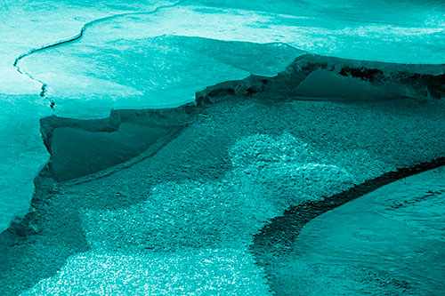 Cracked Ice Frozen Shoreline Melting (Cyan Shade Photo)