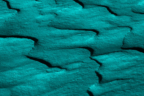 Curving Sparkling Snow Drifts (Cyan Shade Photo)