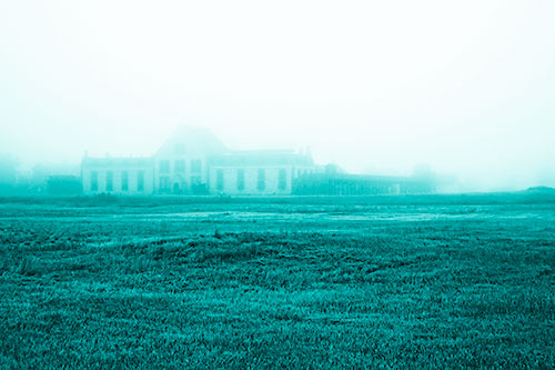 Dense Fog Consumes Distant Historic State Penitentiary (Cyan Shade Photo)
