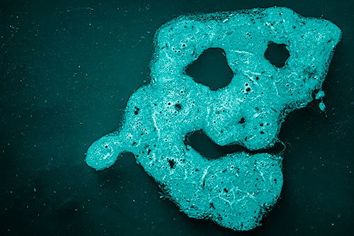 Droopy Smiling Bubble Face Floating Above Soil (Cyan Shade)