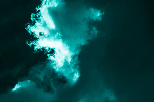 Evil Cloud Face Snarls Among Sky (Cyan Shade Photo)