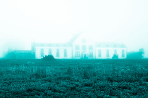 Fog Engulfs Historic State Penitentiary (Cyan Shade Photo)