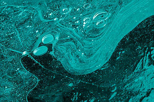Frozen Bubble Clusters Among Twirling River Ice (Cyan Shade Photo)